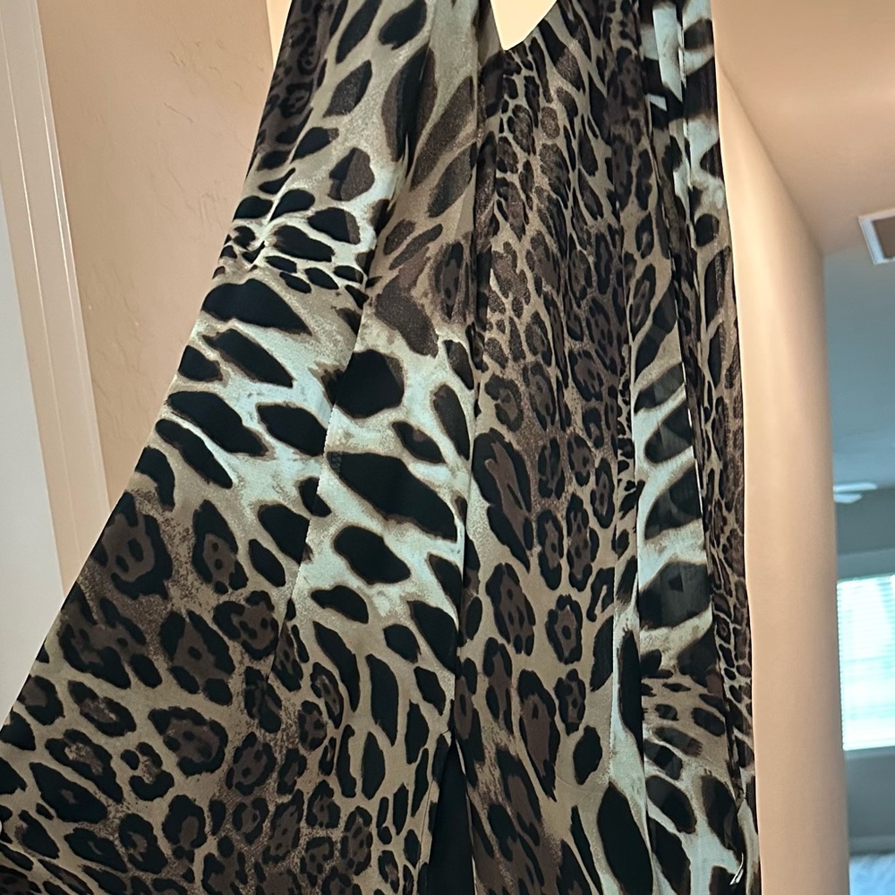 Cache animal print jumpsuit with matching tie around waist.